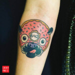 Donut pug tattoo on Kerry Rogers, by Fernando of Fifth Estate Tattoo Gilbert AZ
